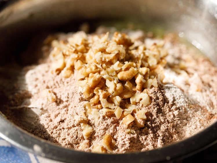 chopped walnuts and sifted dry ingredients added in the mixing bowl