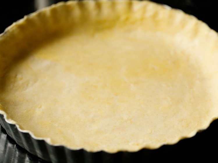 homemade all butter pie crust recipe pressed into a fluted pie tin