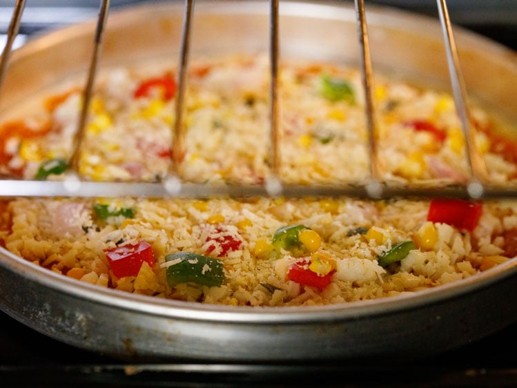 veg pizza being baked in the oven