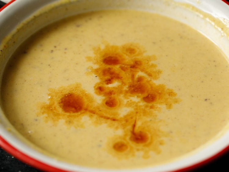 easy pumpkin pie filling with vanilla extract in a white bowl