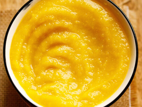 pumpkin purée in a white bowl with a black rim