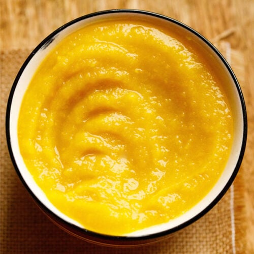 pumpkin purée in a white bowl with a black rim