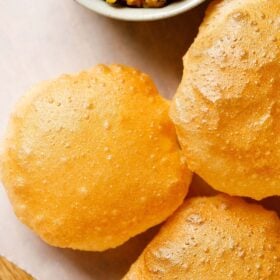 poori placed on parchment paper