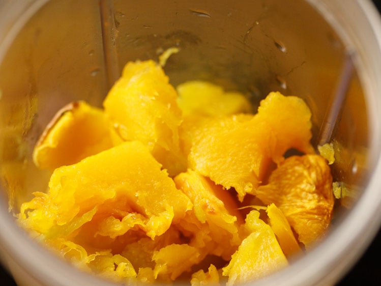 cooled and cooked pumpkin cubes in a blender