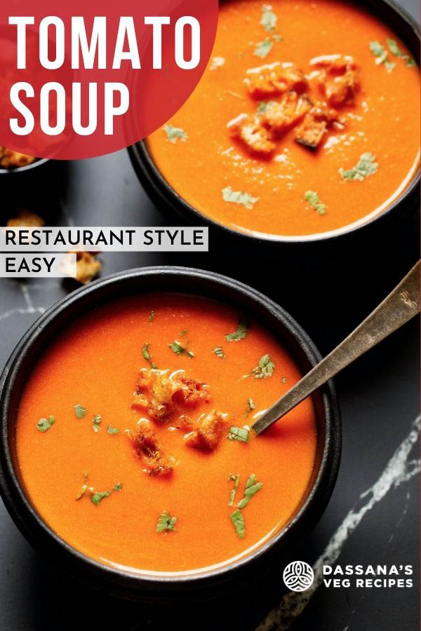 Is tomato soup good for you when sick 1 tomato soup topped with croutons, parsley in two black wooden bowls with silver and brass spoons by the side on a black marble