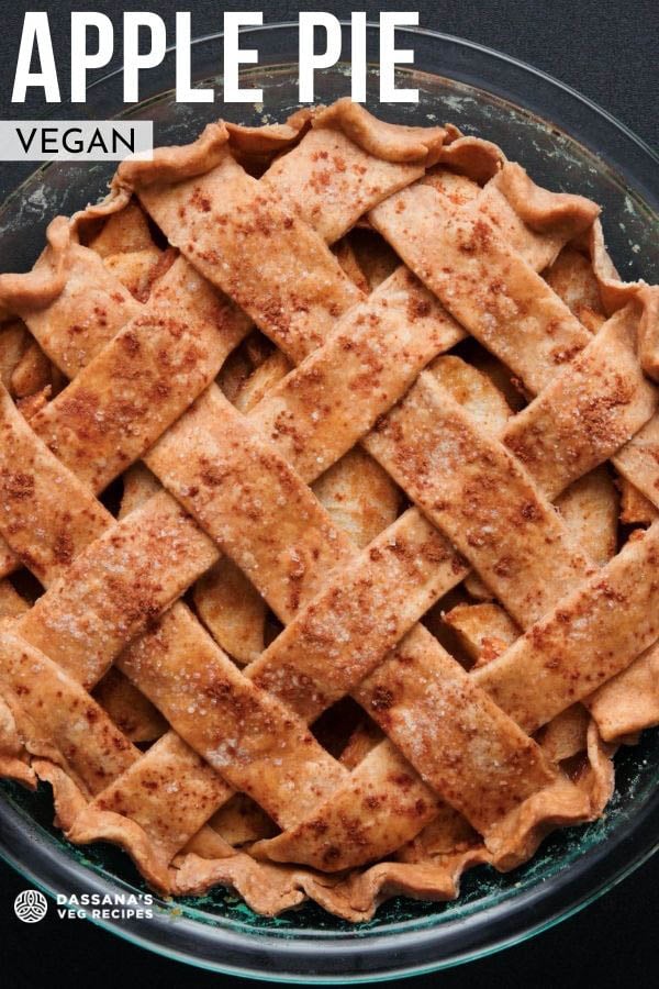a triangular wedge of apple pie on an off-white plate