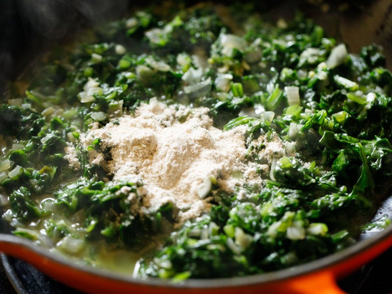 flour added to the spinach mix prior to stirring