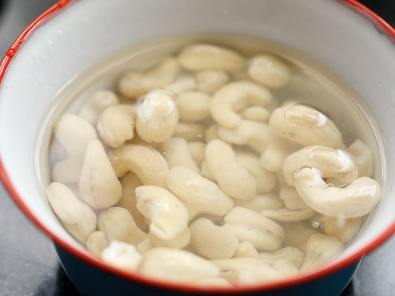 raw cashews soaking in water