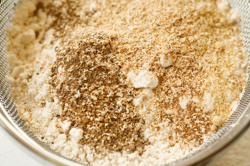 closeup shot of dry ingredients for baking recipe in sifter