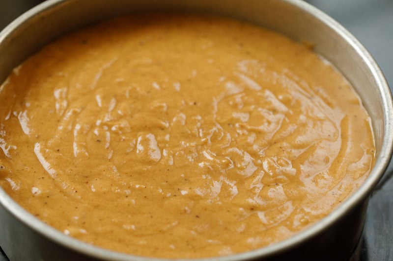 top shot of vegan apple cake batter in the baking dish