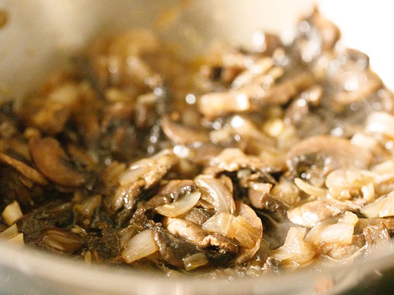 mushrooms added to the pan with the  onions and garlic, after they have cooked and the water has evaporated