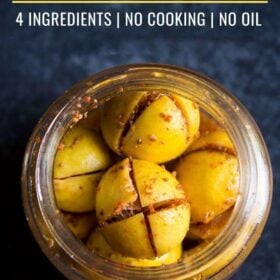 lemon pickle in a glass jar on a blue board.