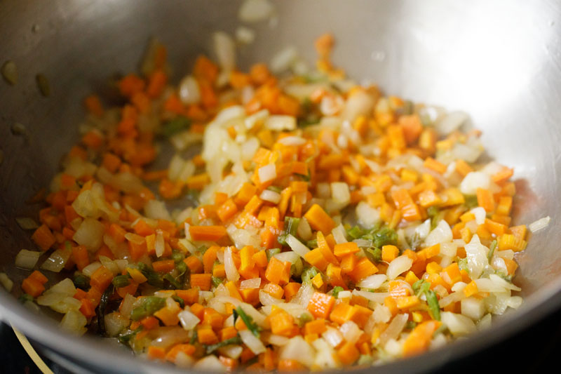 onions, carrots, celery, garlic being sautéed