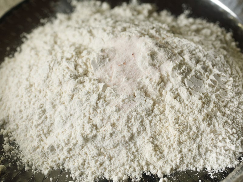 flour and salt on a large steel plate