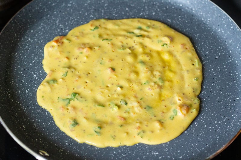 top shot of batter cooking on the skillet