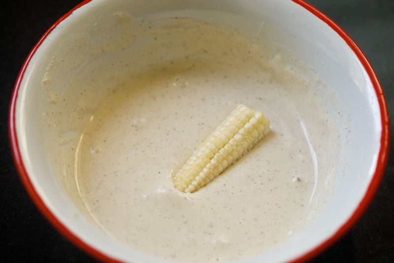 baby corn on top of the batter