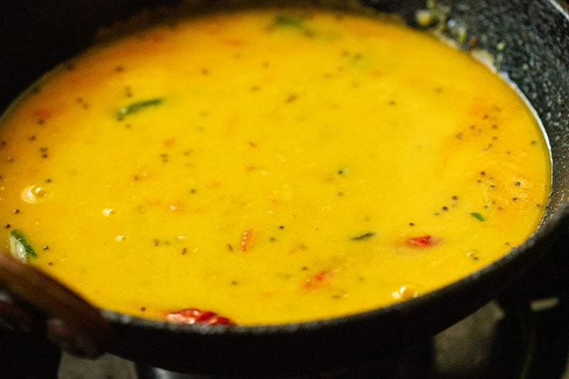 water mixed throughly in skillet with other ingredients to make dal fry recipe