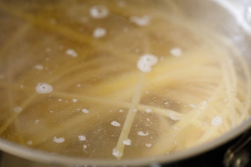 fettuccine pasta immersed in water