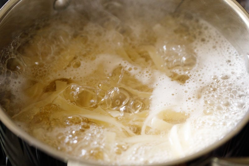 fettuccine cooking in water 