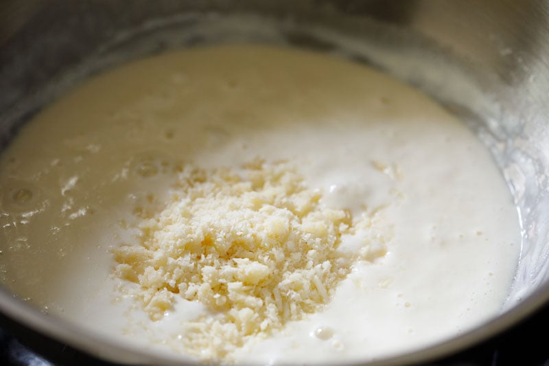 grated parmesan cheese added to cream