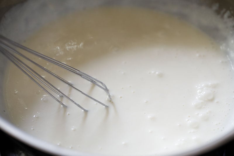 cheese mixed with cream to make creamiest Alfredo sauce for pasta