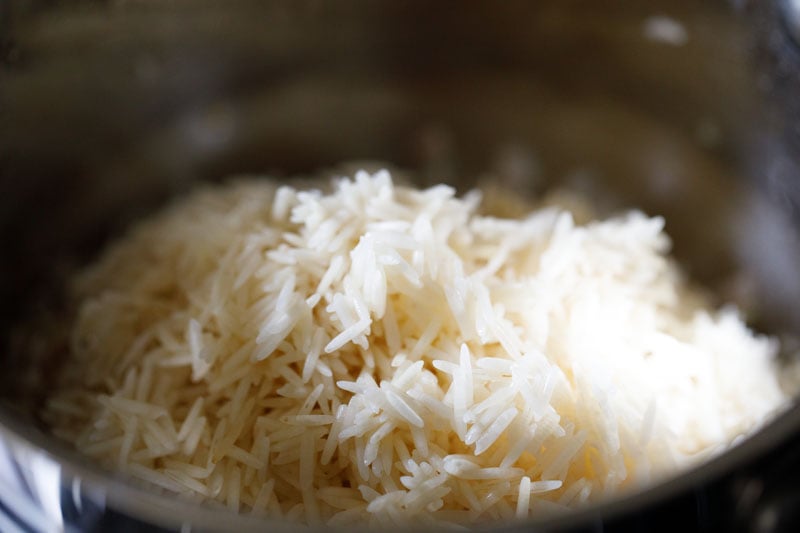 long grained rice added to the pan