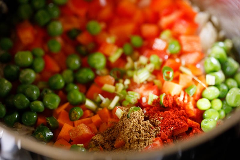 mix vegetables and spices added to the pan