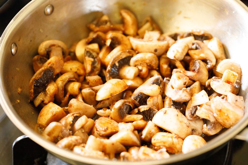 mushrooms tossed together with seasonings and wine to cook down