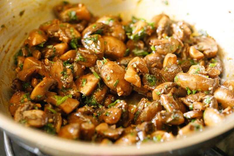 mushrooms after parsley has been added and stirred through