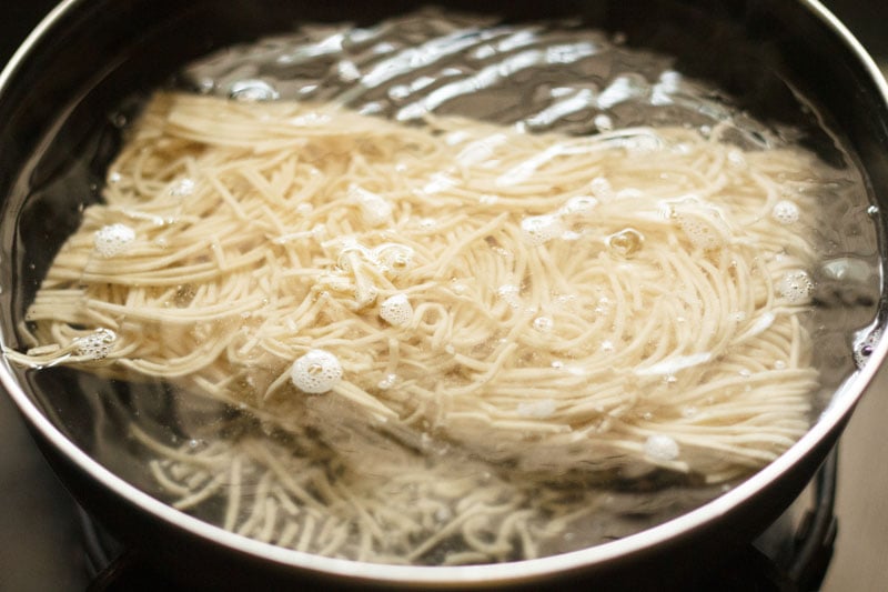 noodles submerged in hot water