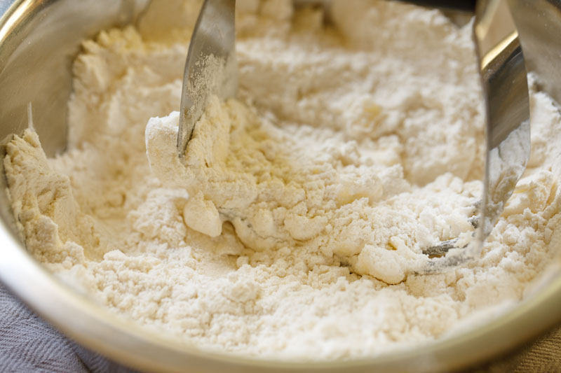 cutting butter in flour with a pastry cutter