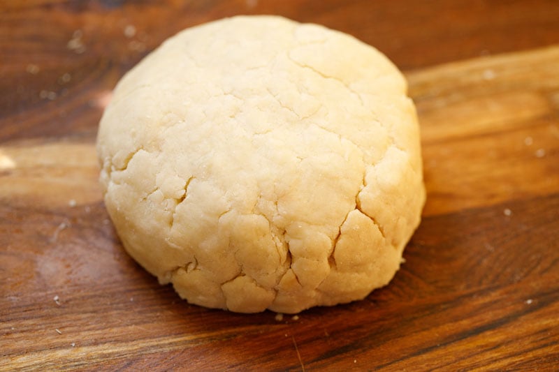 shortcake dough formed and placed on a wooden board