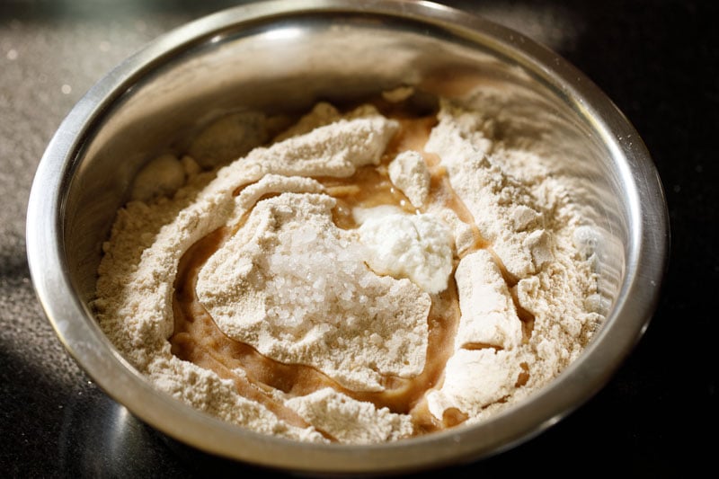 wheat flour, salt, oil, curd in bowl.