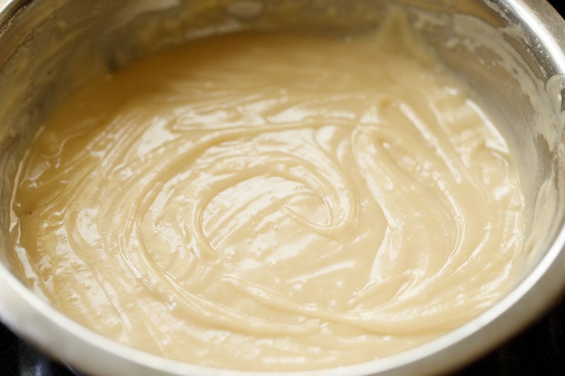 eggless vanilla cake batter evenly mixed