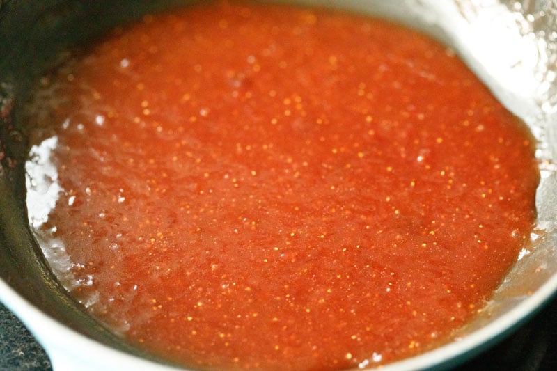 strawberry glaze icing thickened in the pan