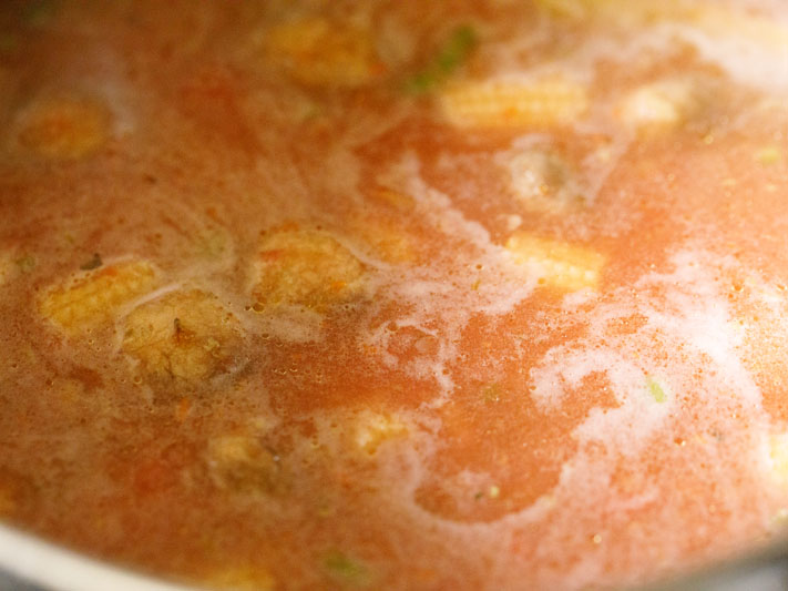 veggies simmering in tomato broth