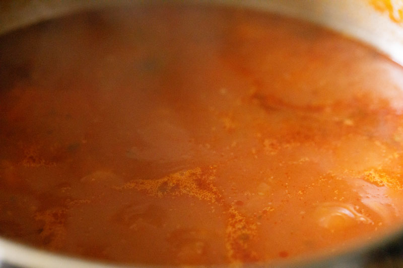 beans added to soup pot