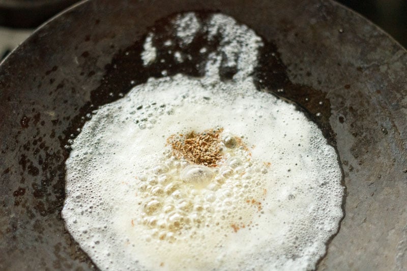 fry carom seeds in melted butter