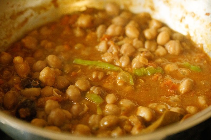chickpeas mixture getting simmered in the pan. 
