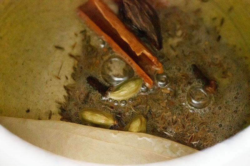 Top shot of spices cooking in pressure cooker