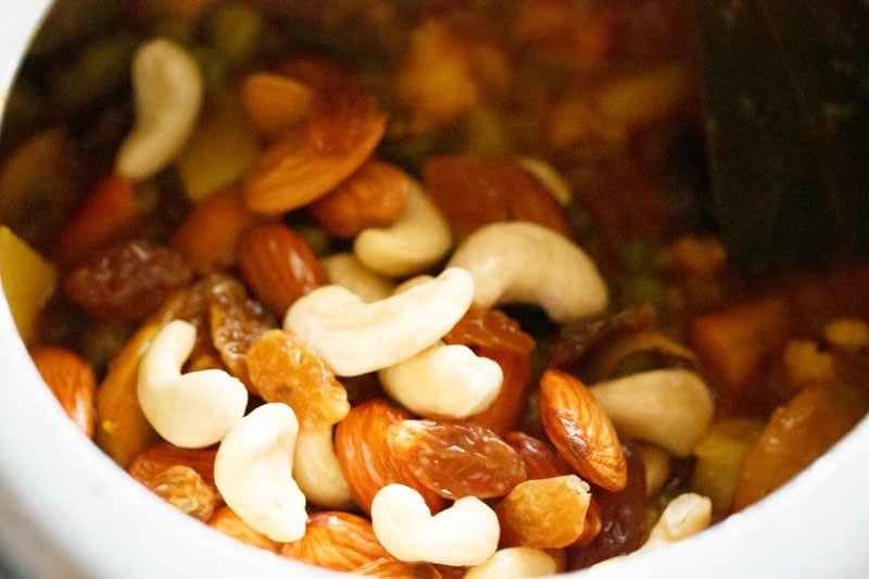 Top shot of mixed nuts and raisins in cooker