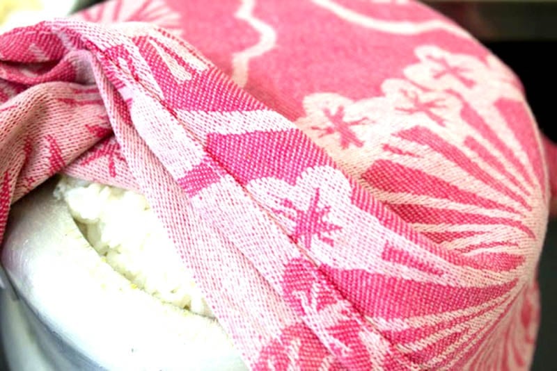 Pan of rice sealed with red cloth