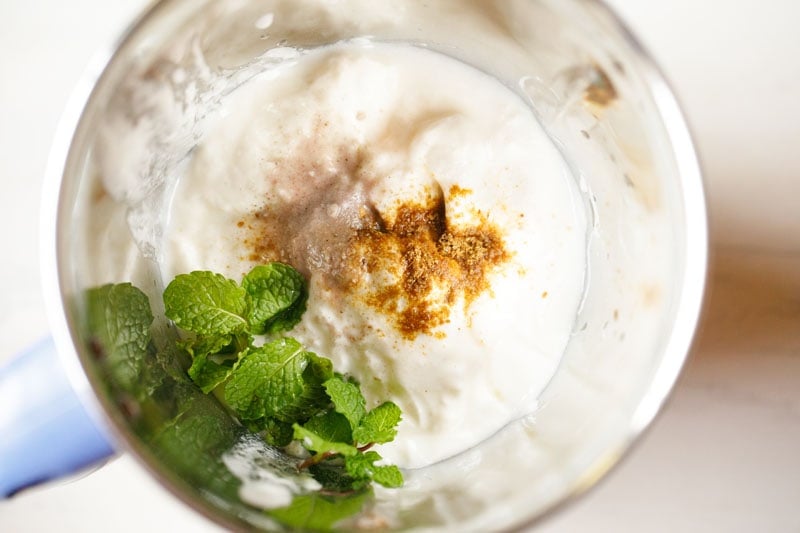 curd, mint sprigs, black salt, cumin powder in a blender