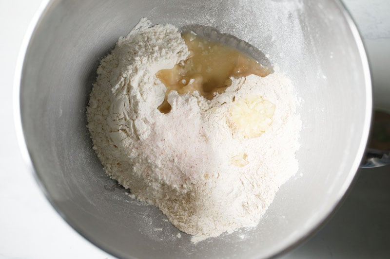 flours, garlic, salt, oil, sugar in a bowl