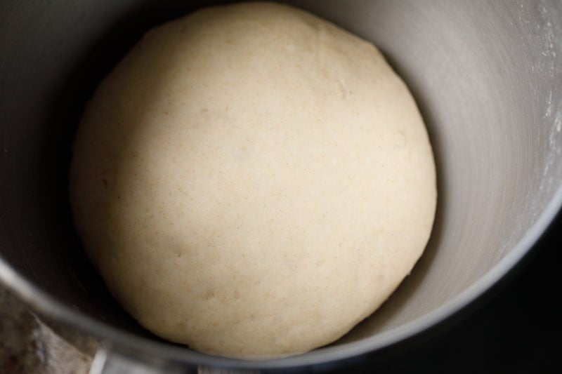 garlic naan dough leavened and doubled in bowl