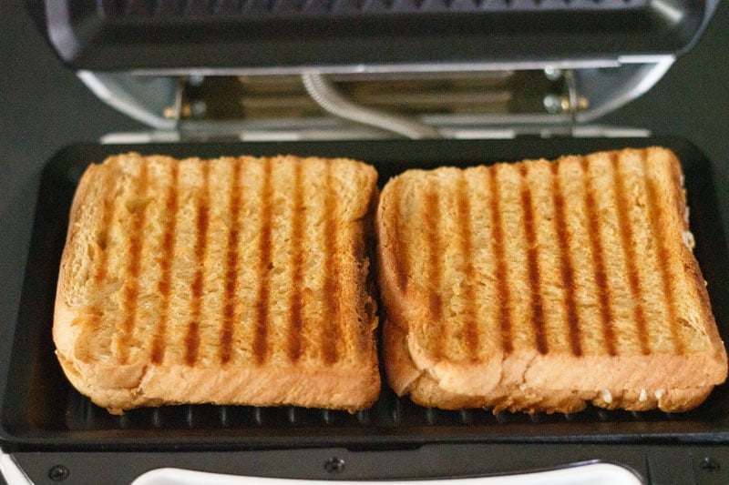 grilled cheese sandwich inside the electric grill