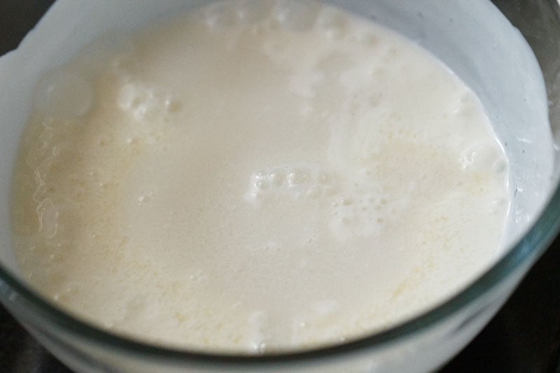 water added to whisked curd