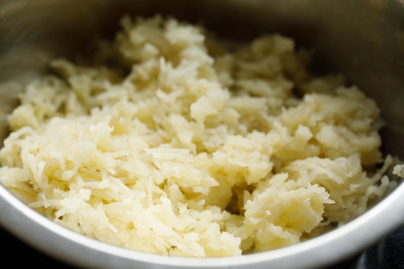 grated potatoes in a bowl