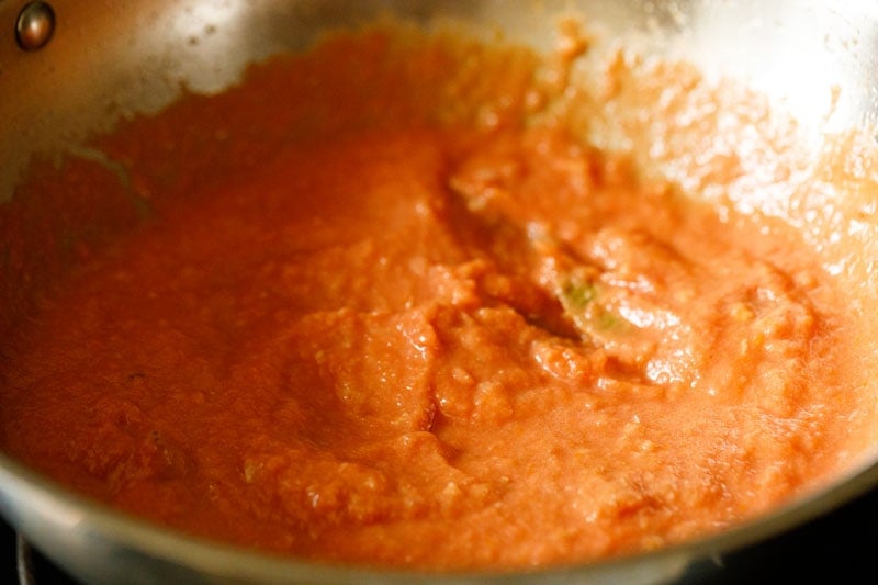 tomato puree in the pan