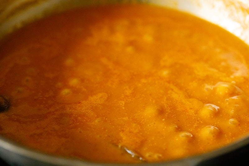 kofta gravy simmering in pan